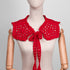 Red crocheted collar on a mannequin against a gray background